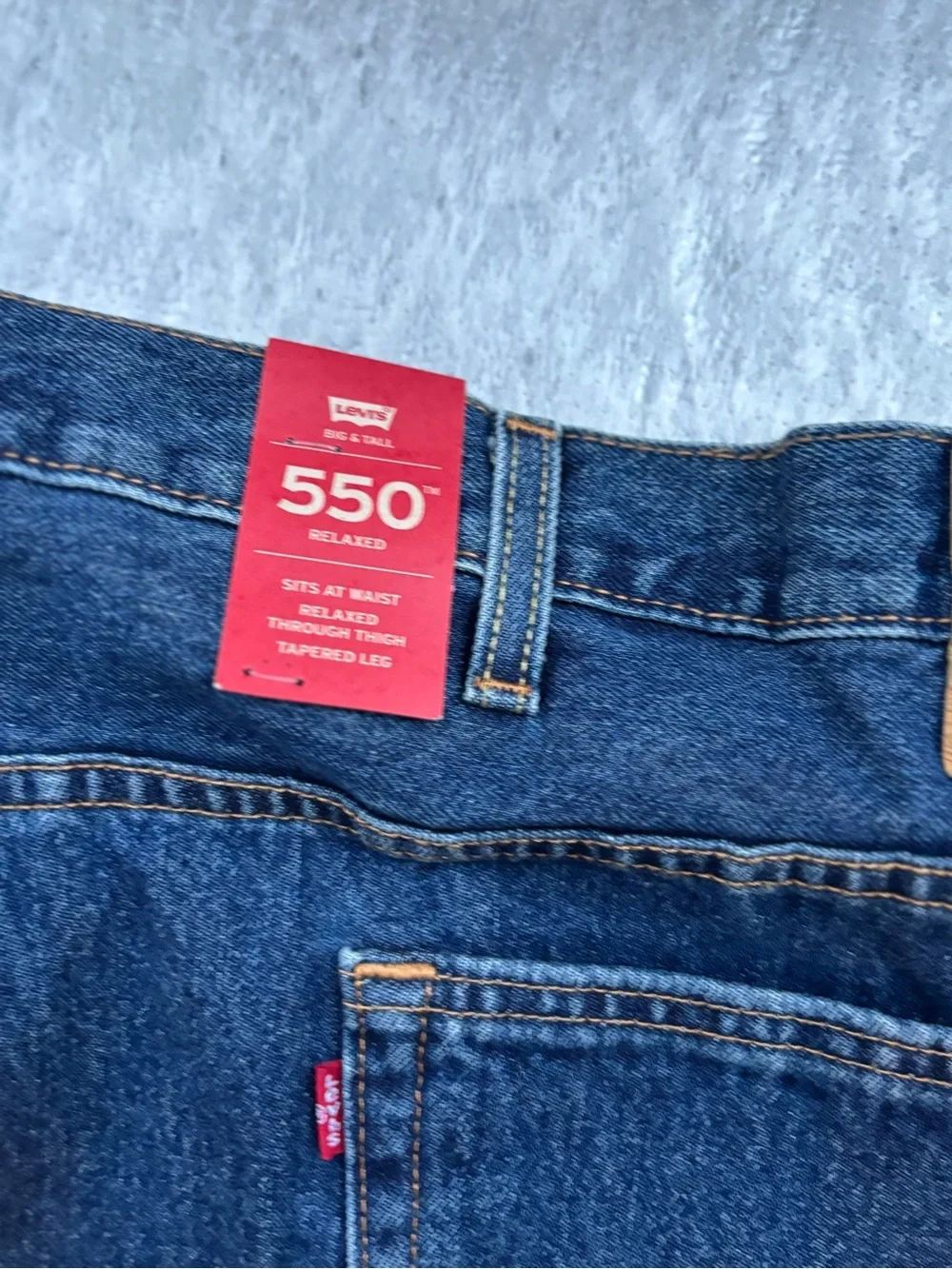 NWT Levi's 550’s with a 63W x 30L relaxed fit.